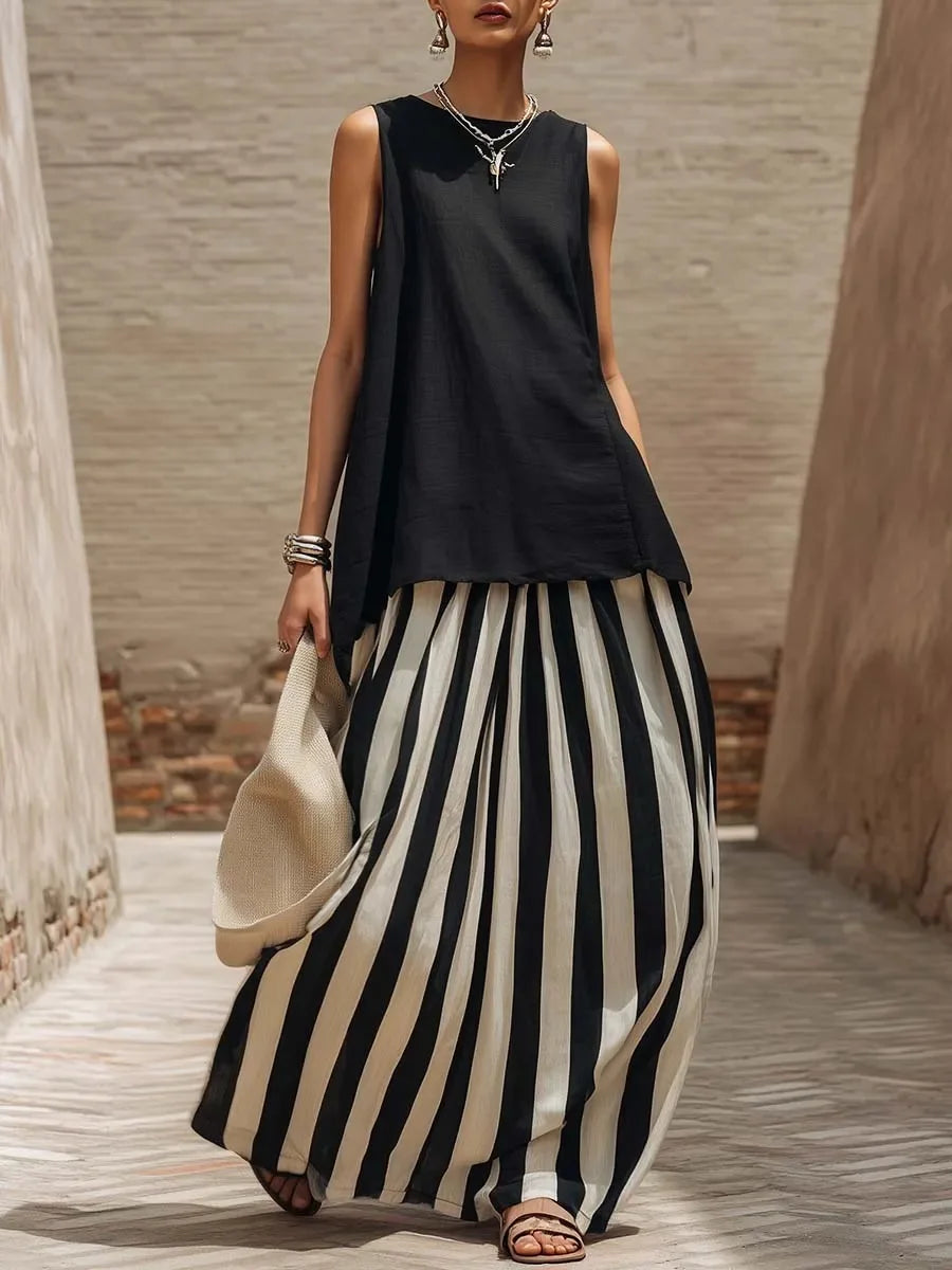 Black sleeveless tank top and high-waist striped maxi skirt set in black and white