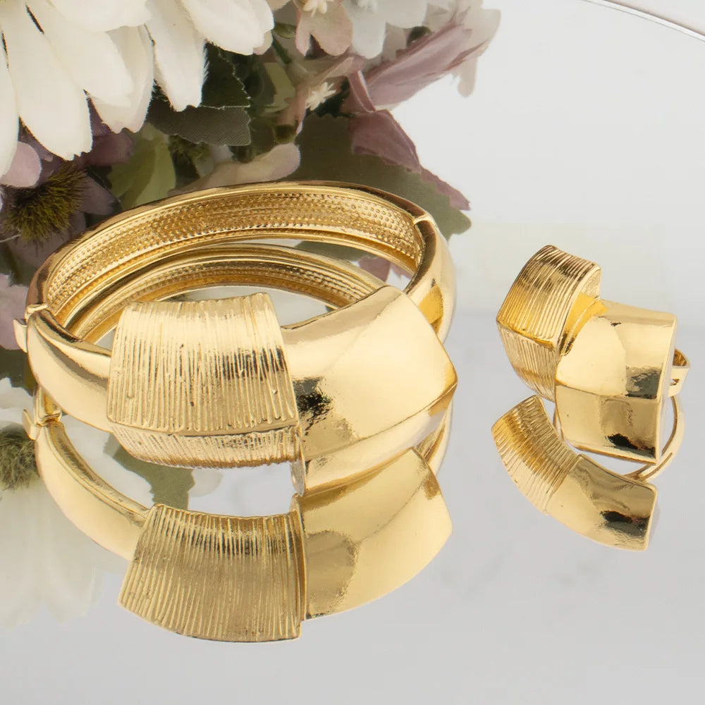 Gold-tone oversized bangle and wide matching ring with geometric plate-like texture