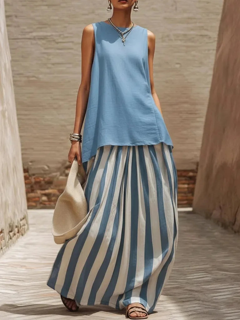 Light blue sleeveless tank top and high-waist striped maxi skirt set in blue and white