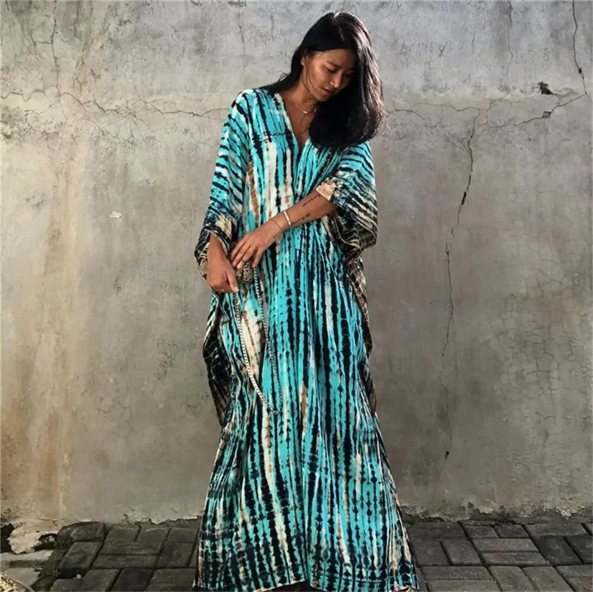 Women’s boho striped beach kaftan in turquoise and dark stripes; V-neck, loose maxi dress.