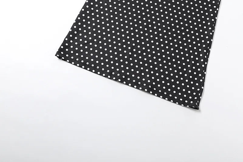 Black maxi skirt with white polka dots and straight hem