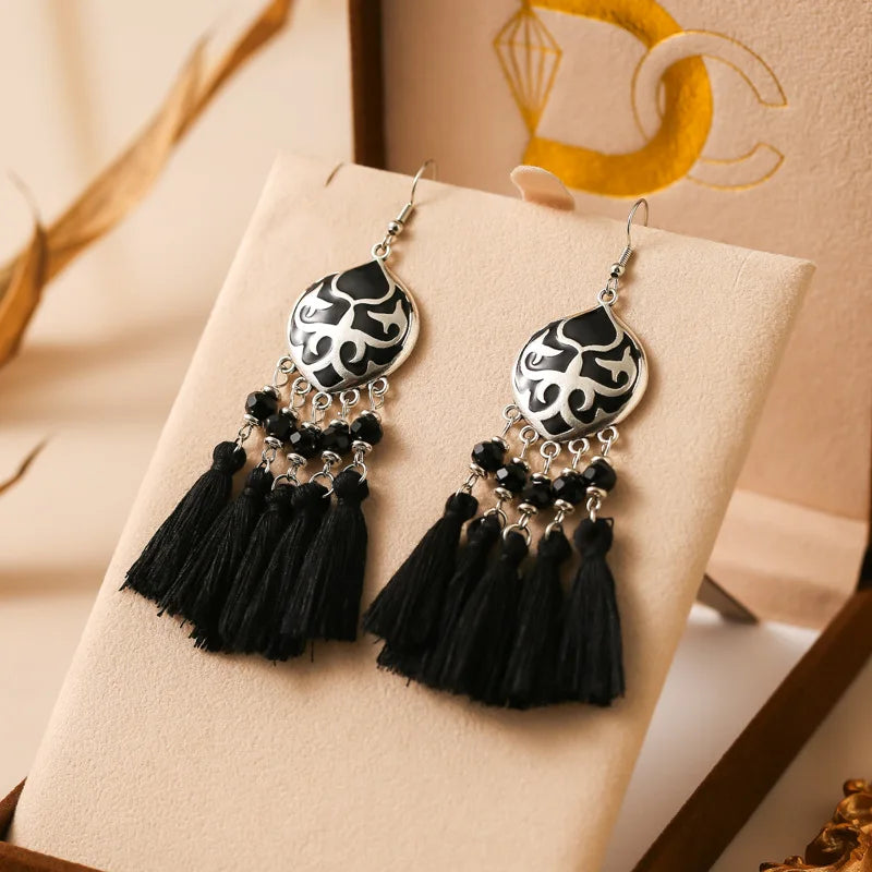 Boho tassel drop earrings with black enamel teardrop charm and black tassels