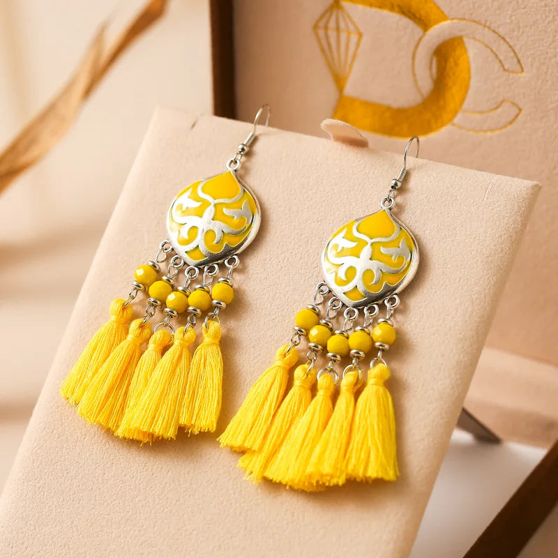 Boho tassel drop earrings with yellow enamel teardrop charm and yellow tassels