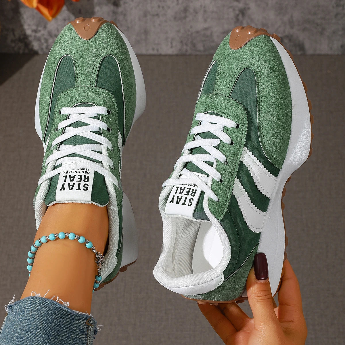 Women's lace-up sneakers, green suede with white side stripes and white lace-up top