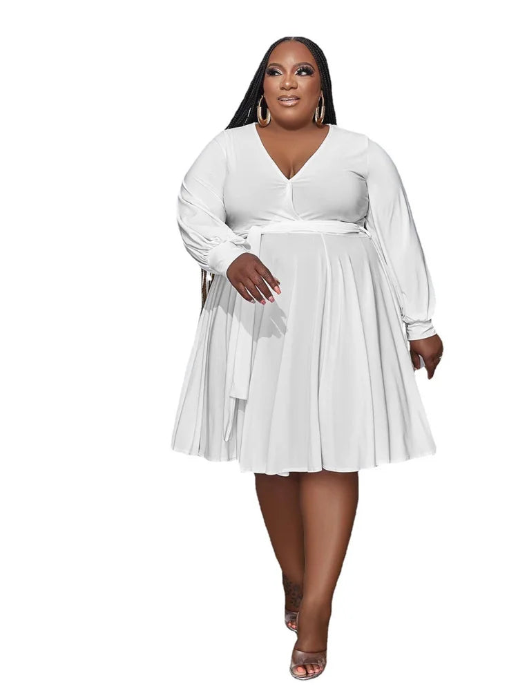White plus size V-neck long-sleeve dress with gathered pleats and waist tie