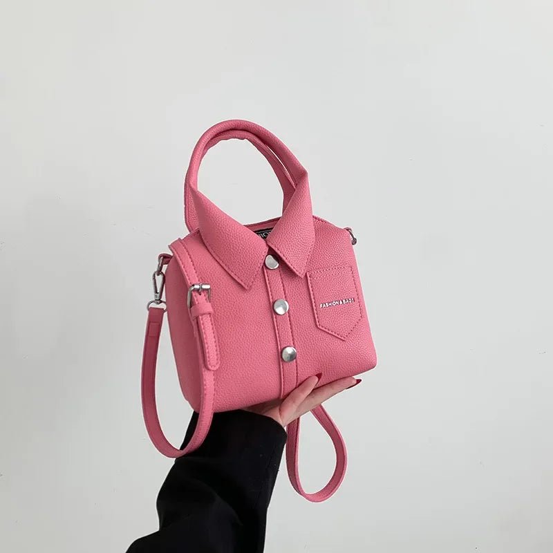 Pink square PU leather crossbody bag with top handle, chain strap, front snap pocket