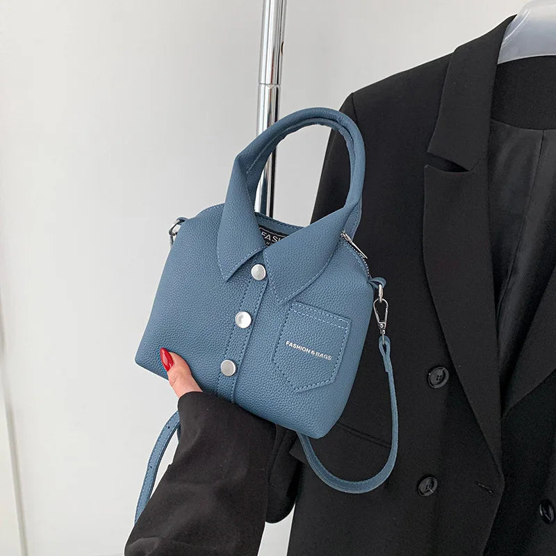 Blue square PU leather crossbody bag with top handle, chain strap, front snap pocket