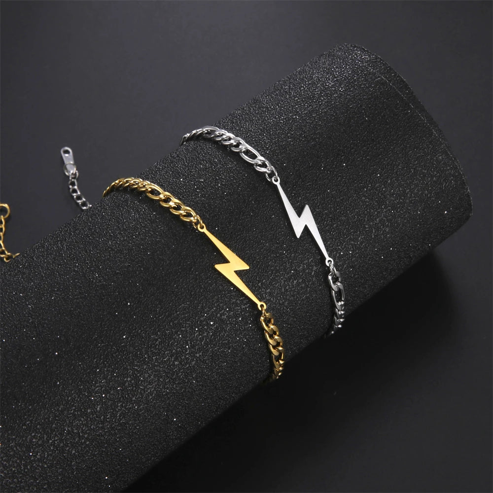 Gold-tone and silver-tone lightning bolt charm bracelets with chain links