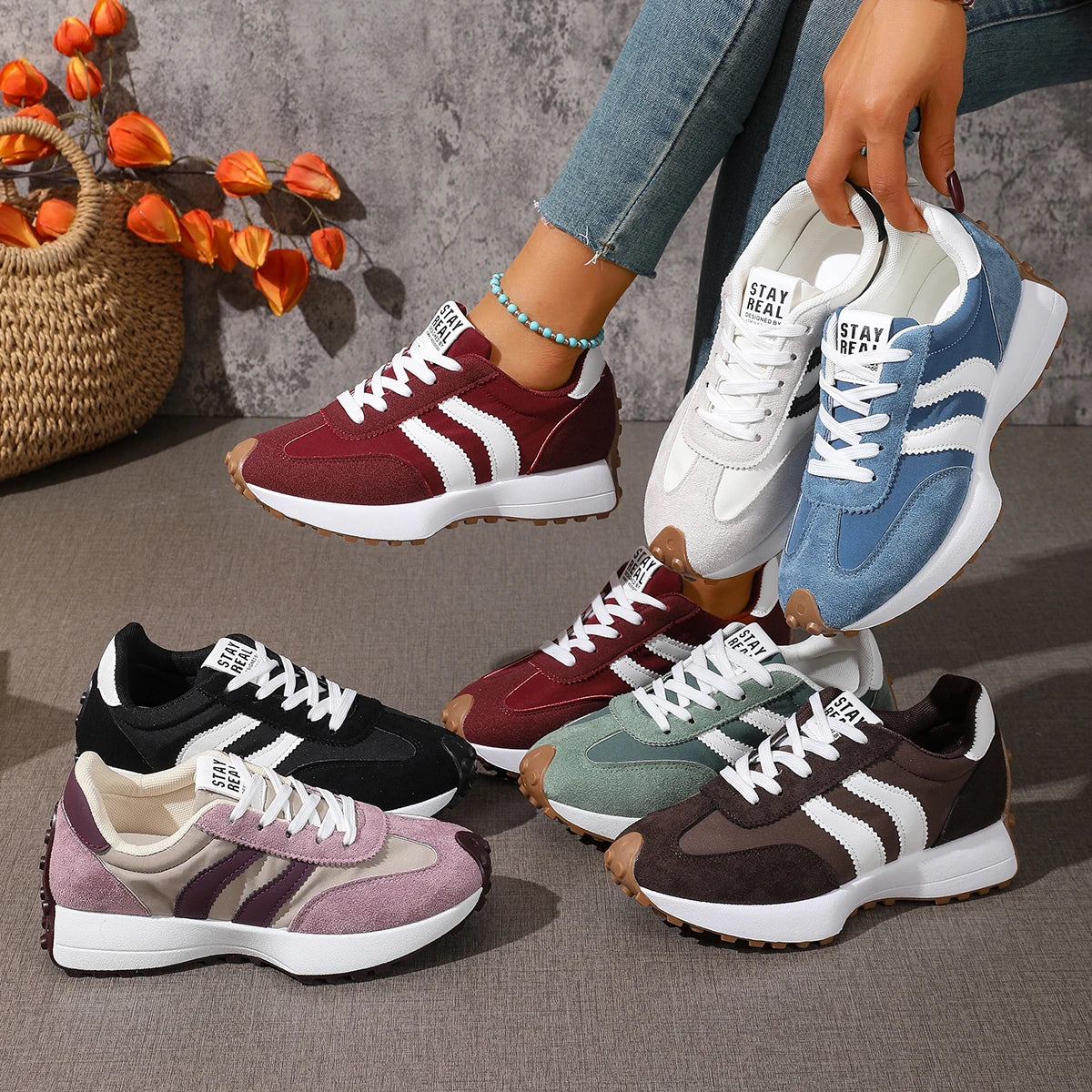 Women's lace-up sneakers, multicolor pairs with white laces and contrast side stripes