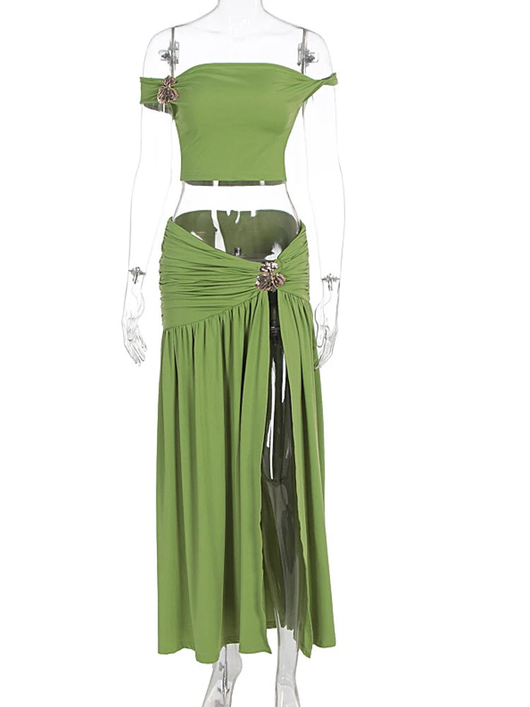 Green off-shoulder cropped top and high-slit maxi skirt set with flower brooch detail