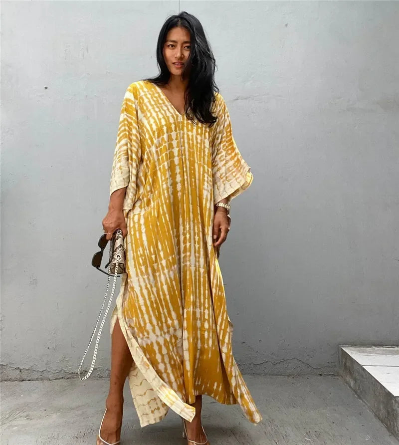 Women’s boho striped beach kaftan in mustard yellow and cream; V-neck, flowy maxi dress.