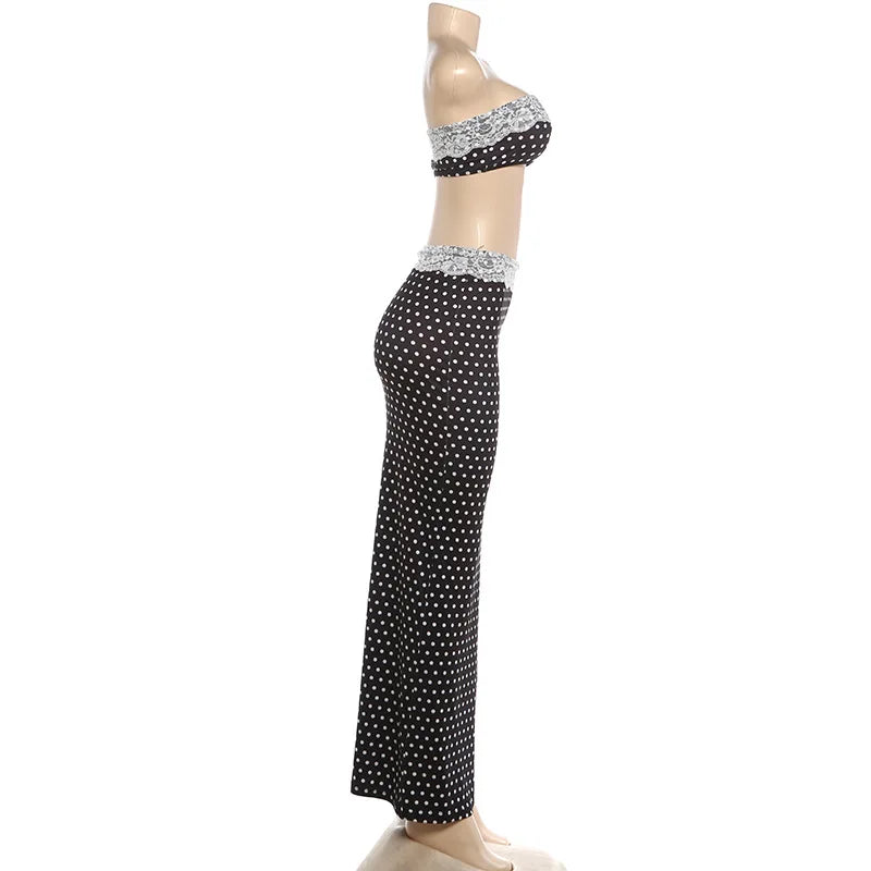 Black polka dot maxi skirt set with bandeau crop top and white lace trim, side view
