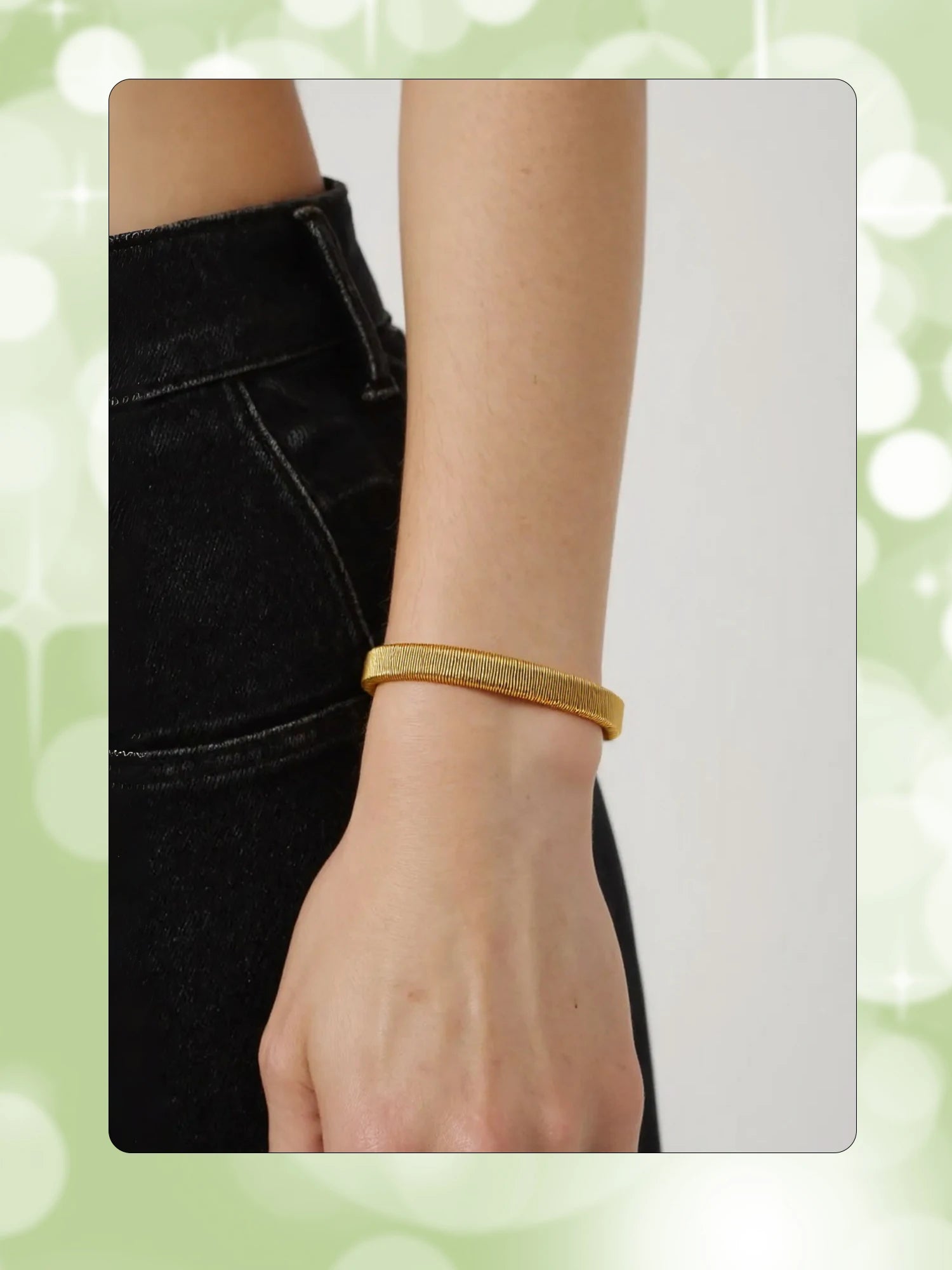 Woven gold-toned open bangle bracelet, adjustable fit on wrist