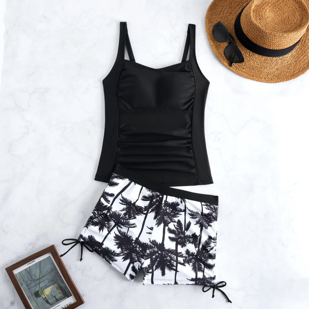 Black ruched tankini top with palm print swim shorts set