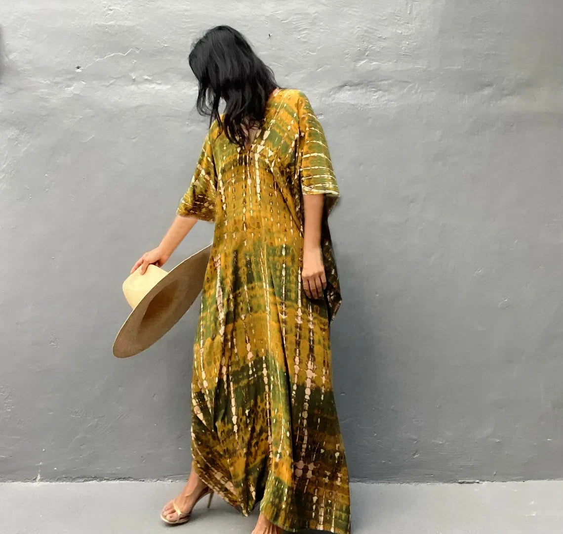 Mustard-yellow printed kaftan cover-up dress with V-neck, short sleeves and flowing fit