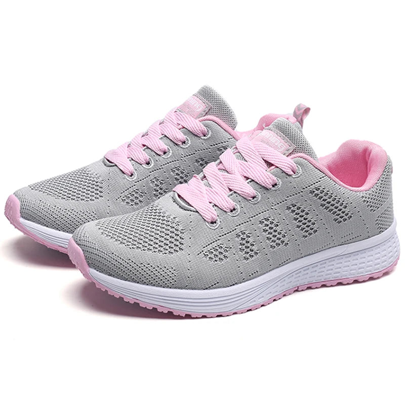 Grey mesh lace-up sneakers with pink laces and trim, white cushioned sole