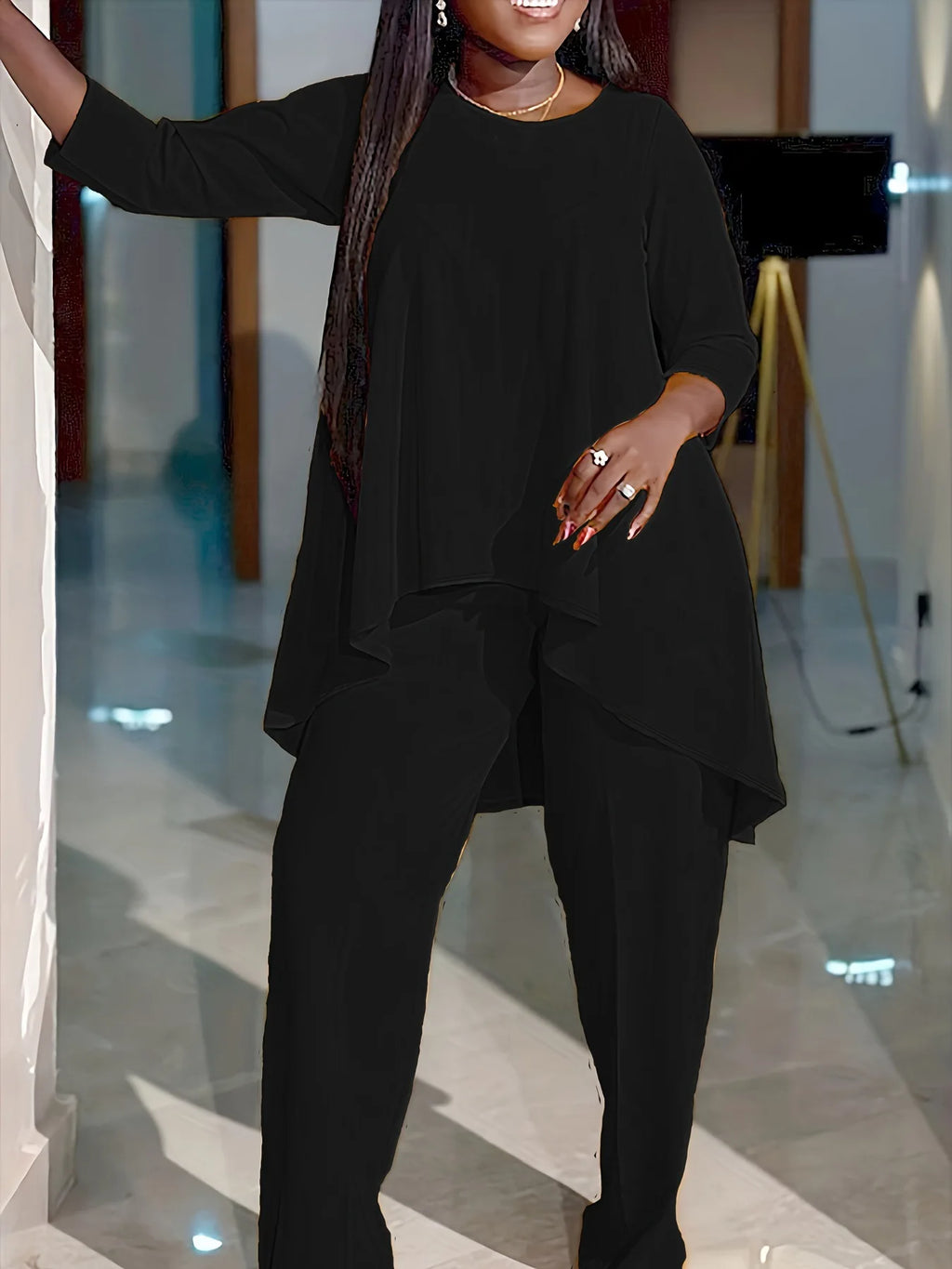 Plus size solid tunic top and pants set, black with layered asymmetric tunic hem