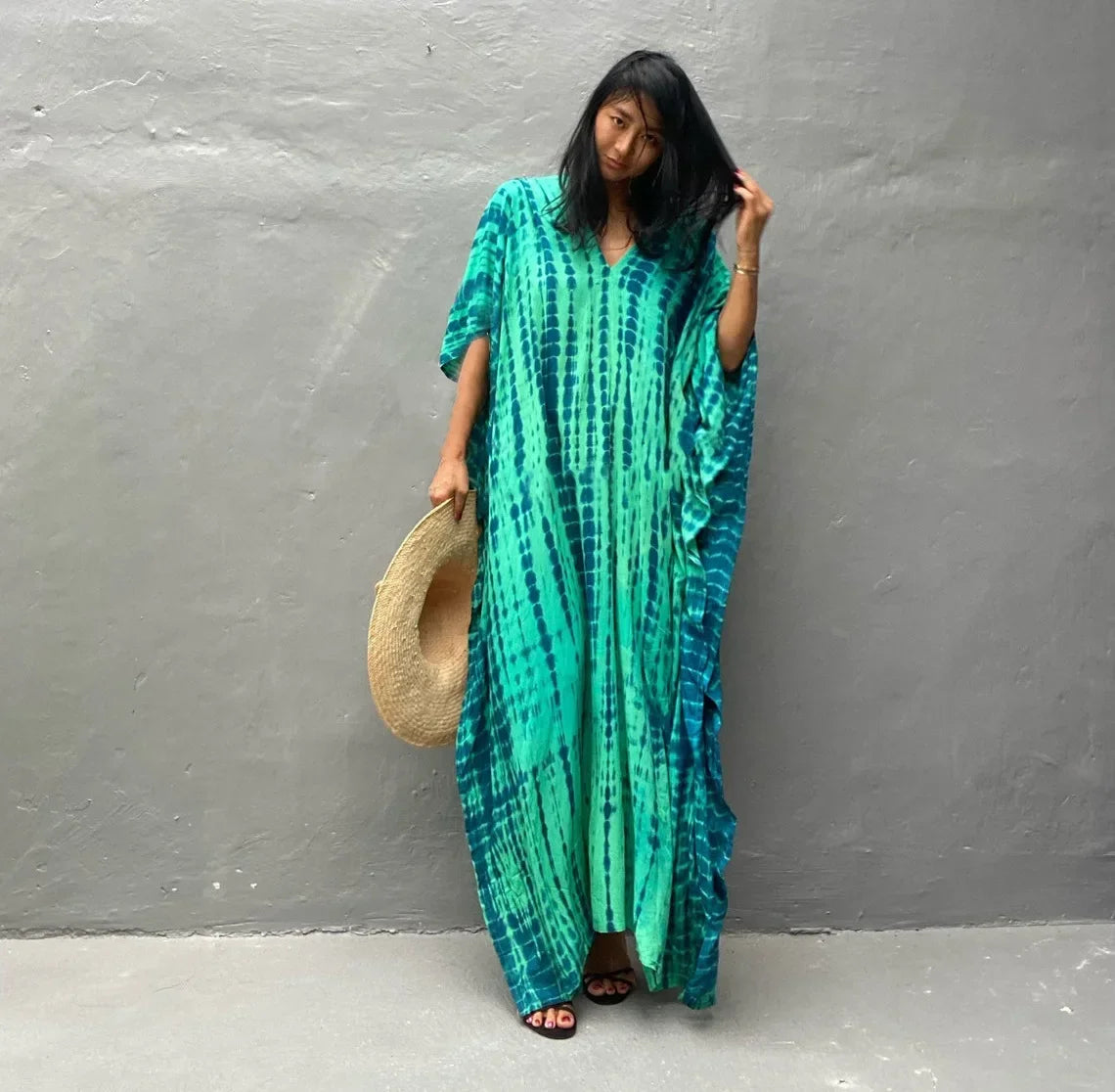 Maxi kaftan dress, teal-green ikat pattern, loose V-neck with short sleeves