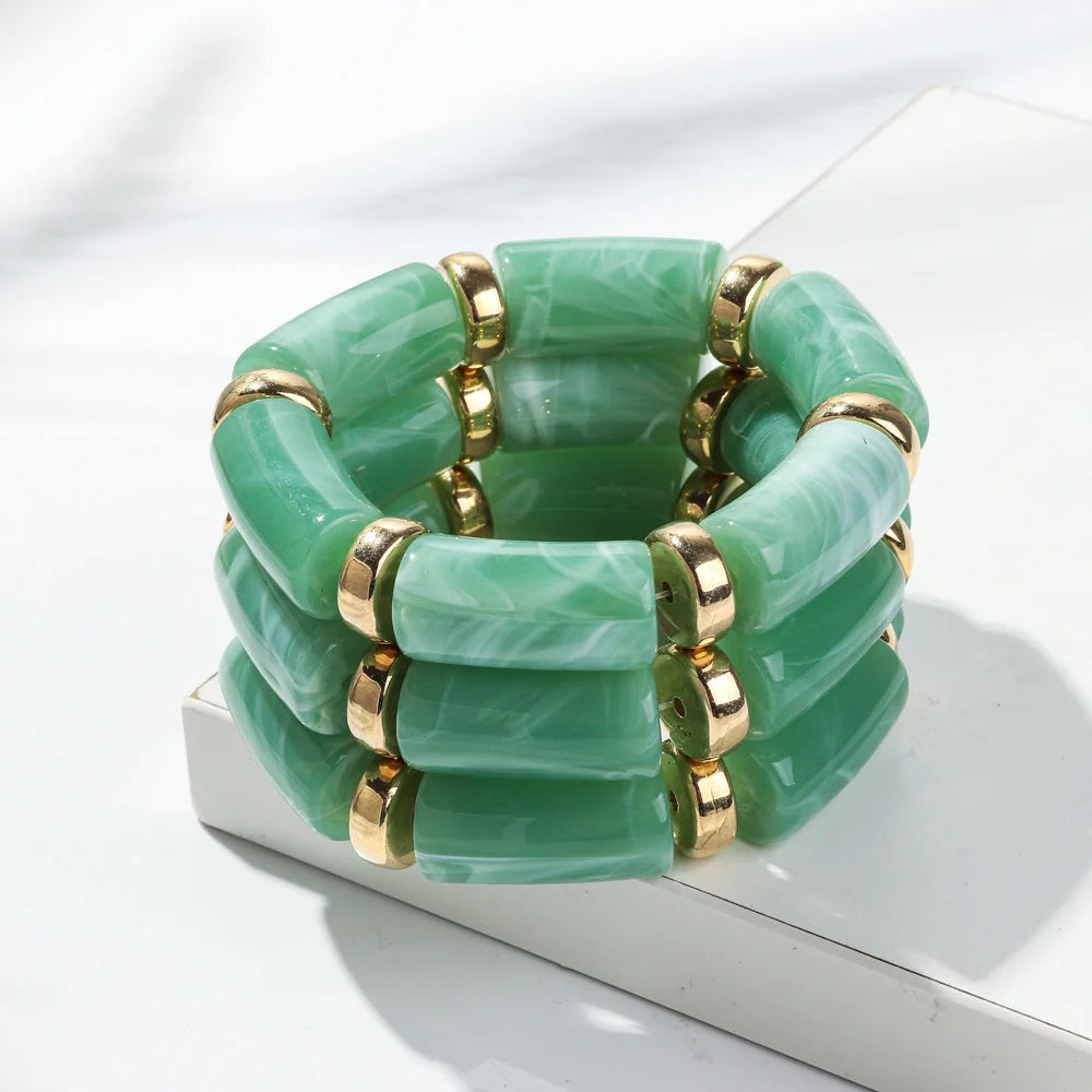 Green bamboo tube bead bracelet set with gold-tone rings, chunky stretch 3-pack