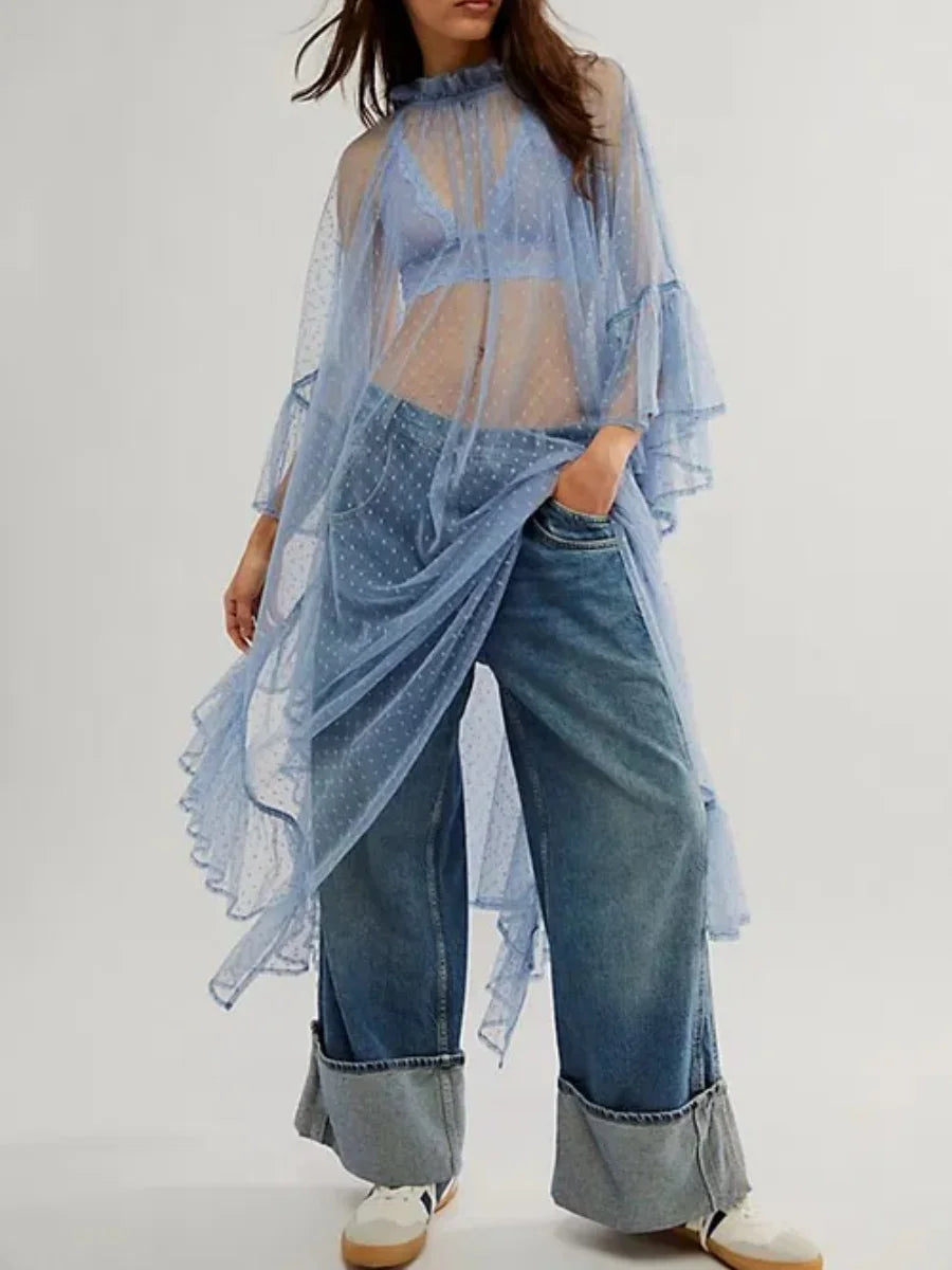 Sheer light blue poncho cover-up with ruffled edges and draped silhouette