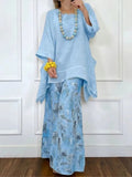 Sky blue printed tunic and wide-leg pants set with flowy sleeves and wide pant legs