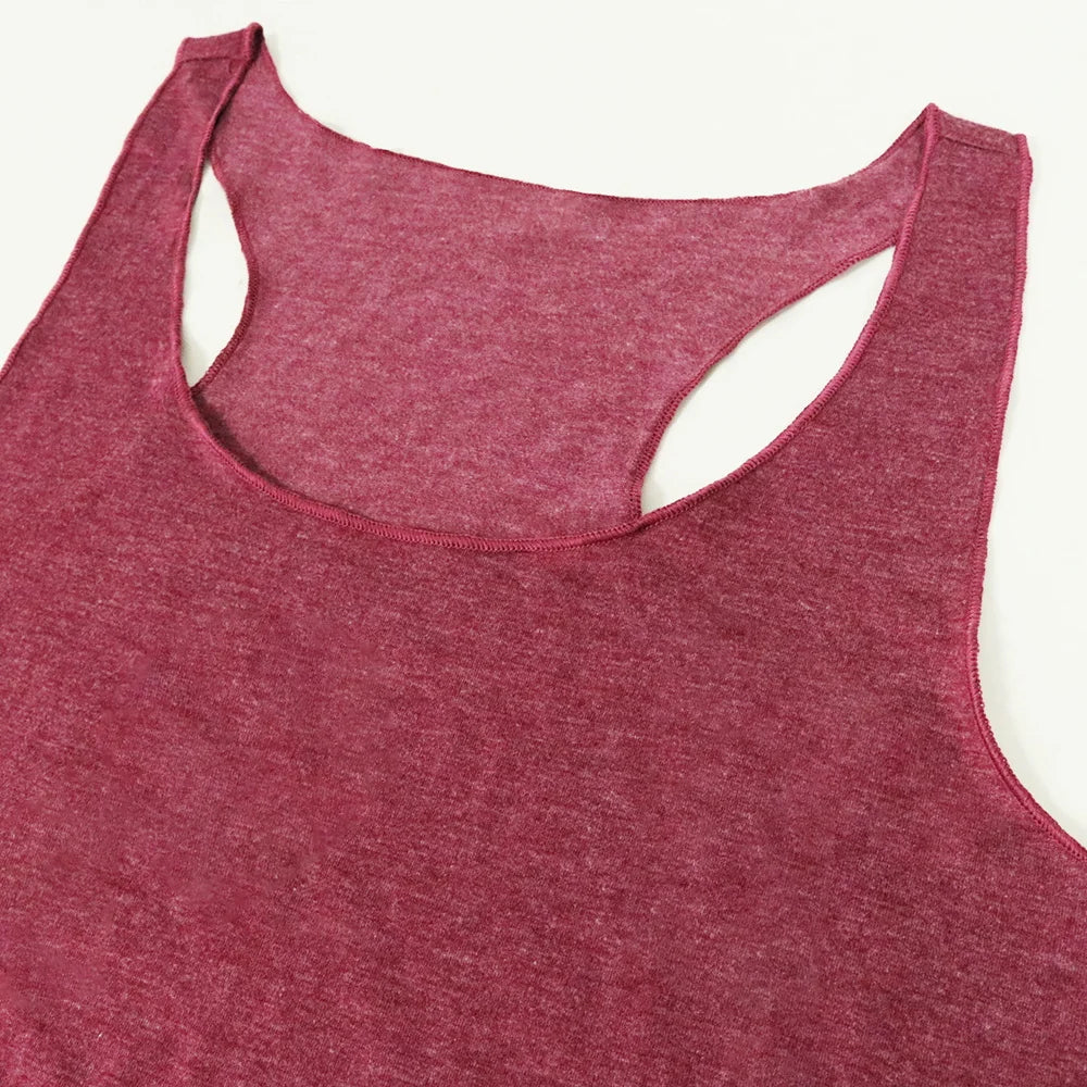 Women’s racerback tank top in maroon, close-up of scoop neck and side cutouts
