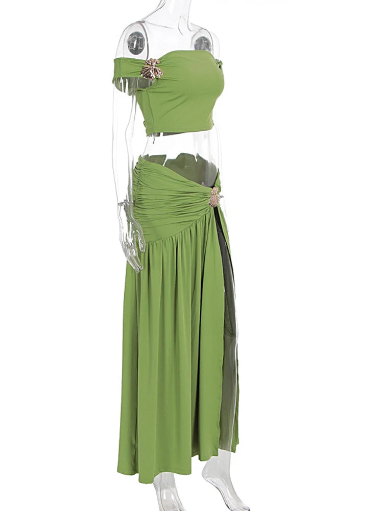 Green off-shoulder cropped top and high-slit maxi skirt set with flower brooch detail