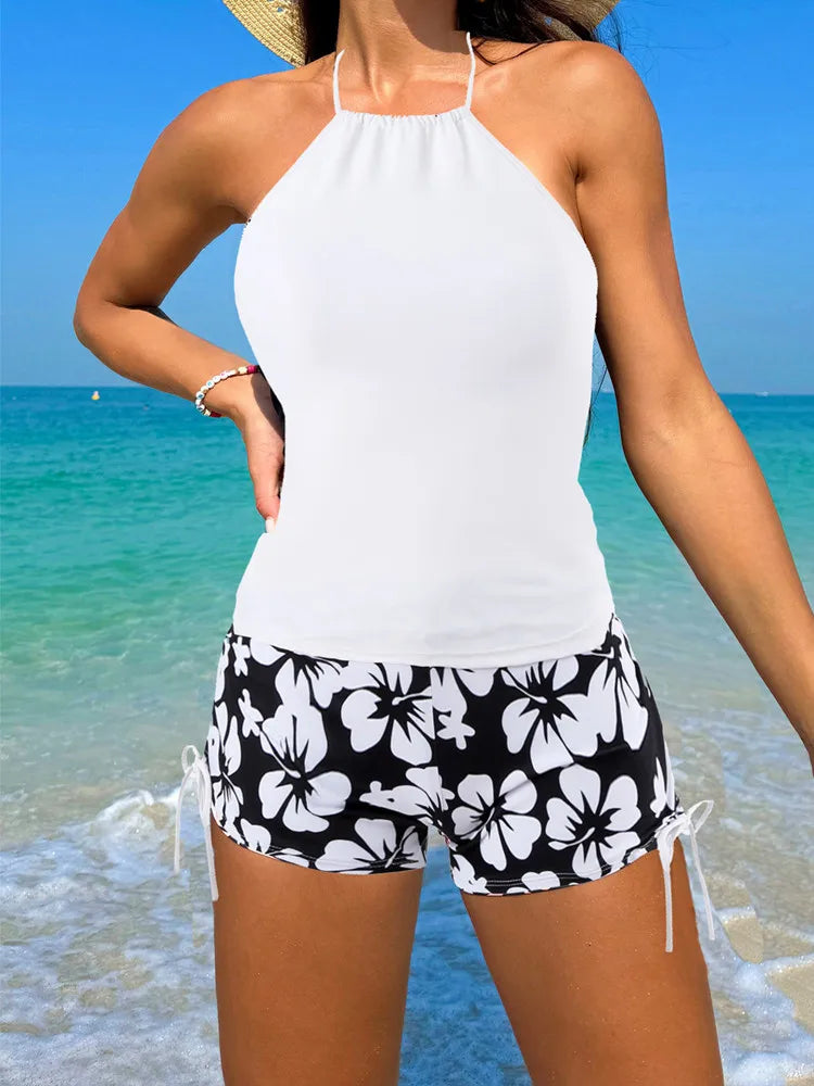 White halter tankini top with floral drawstring swim shorts