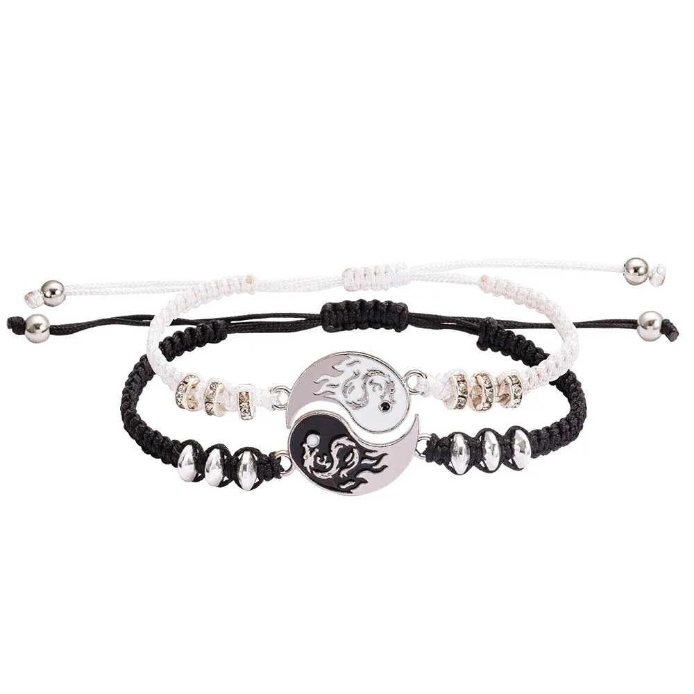 Two-tone cord bracelet set with yin-yang dragon crescent charms and bead detail