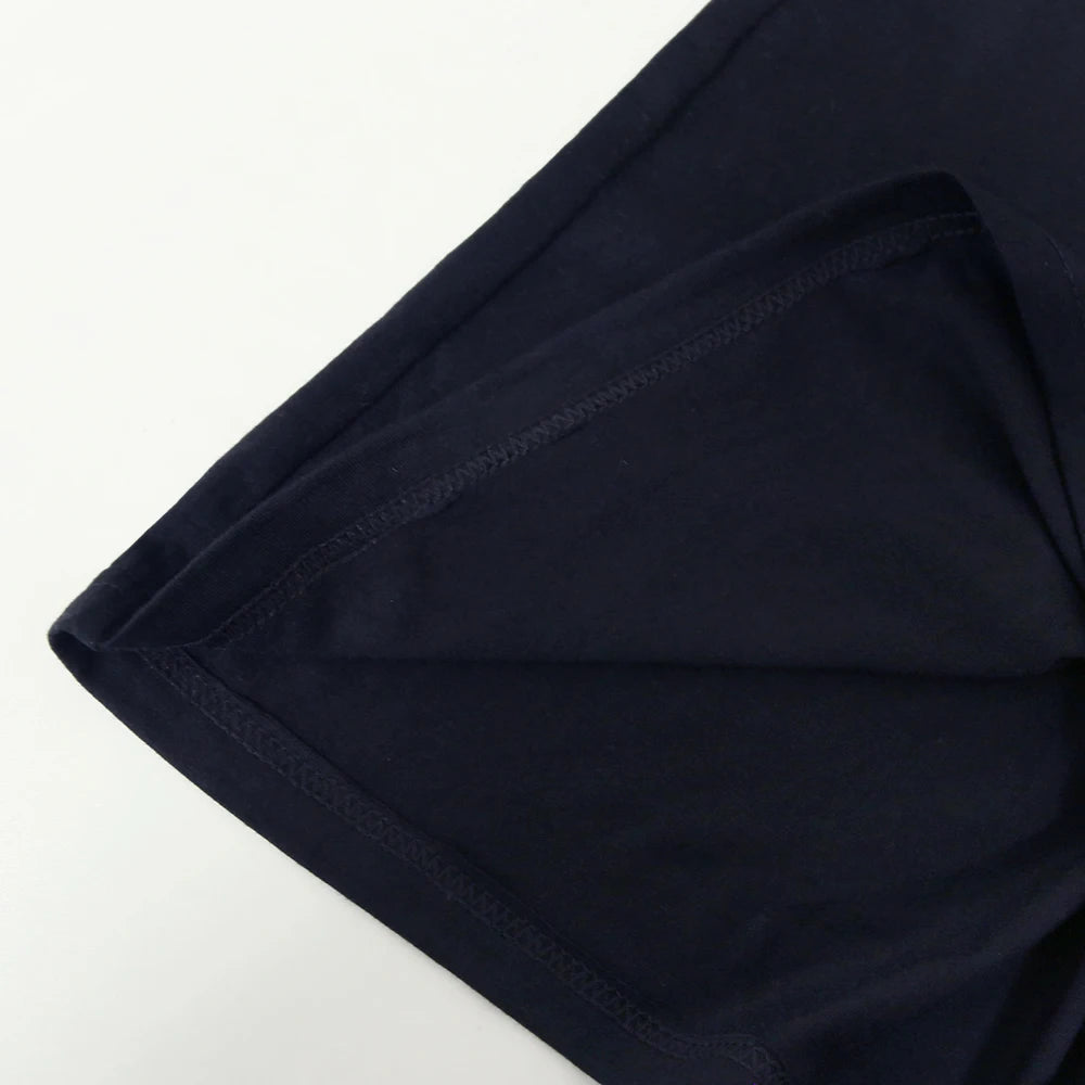 Black sleeveless top hem and seam edge close-up
