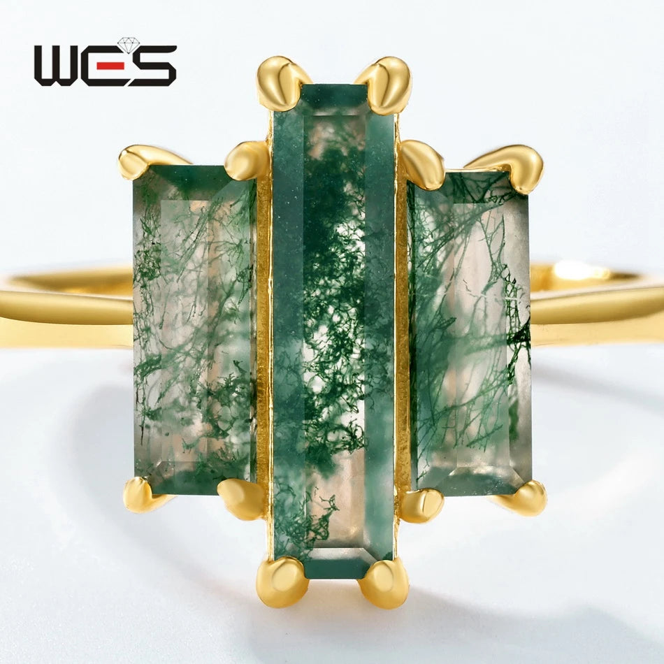 Moss agate three-stone ring, three emerald-green rectangular stones in gold bezel
