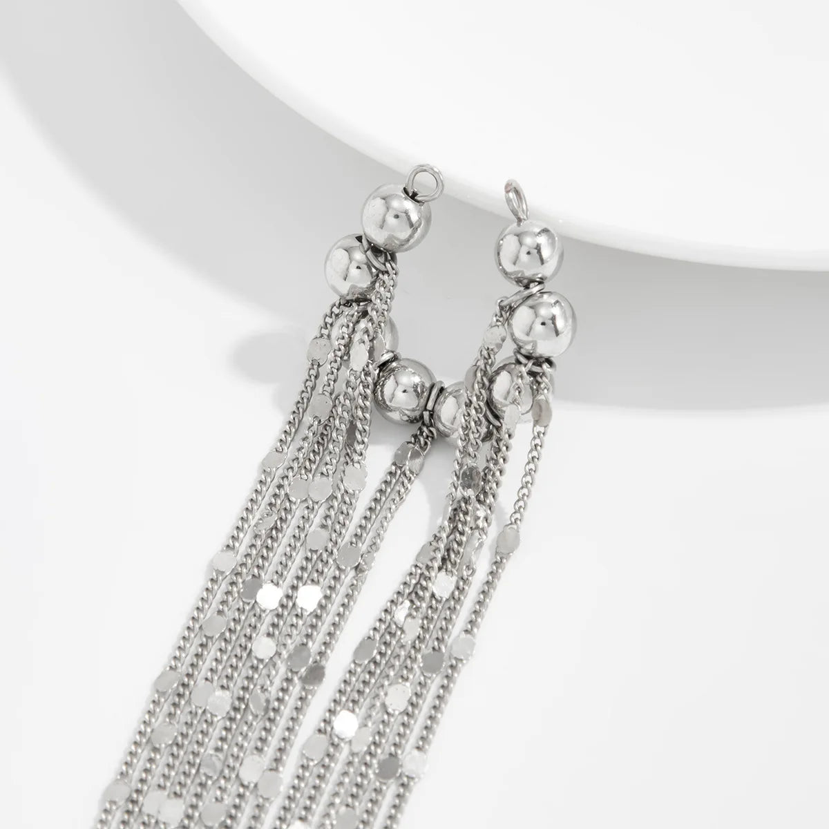 Silver dangling chain tassel ear clips with round bead top and hoop links