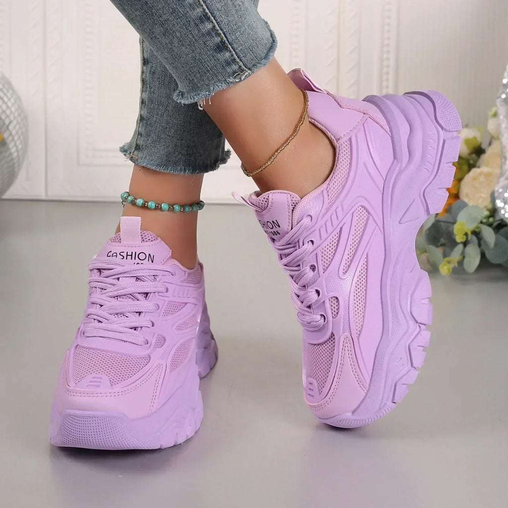 Lavender chunky platform lace-up sneakers with lace-up front and cushioned sole