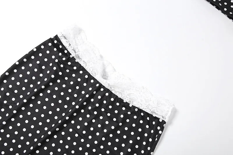 Black polka dot crop top fabric with white lace trim detail