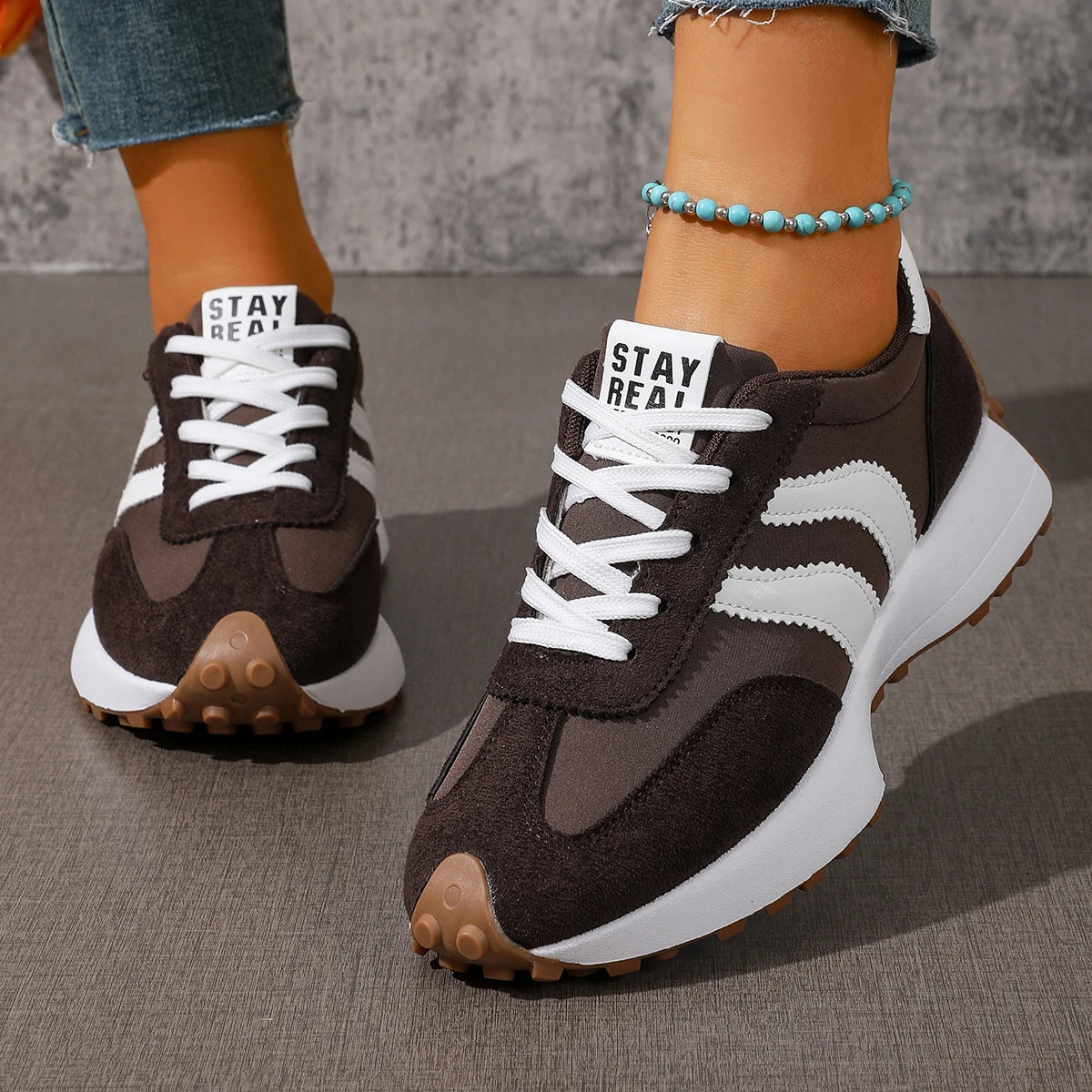 Women's lace-up sneakers, dark brown with white side stripes and white laces