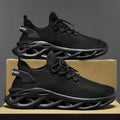 Black breathable mesh sneakers with lace-up front and chunky sculpted outsole