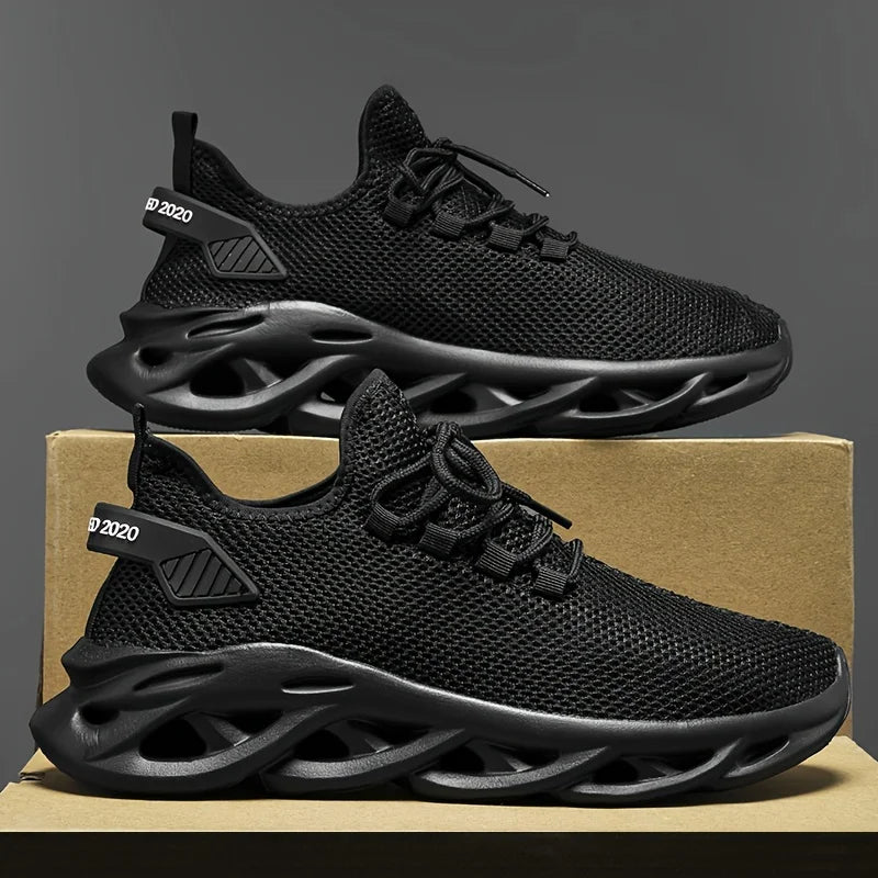 Black breathable mesh sneakers with lace-up front and chunky sculpted outsole