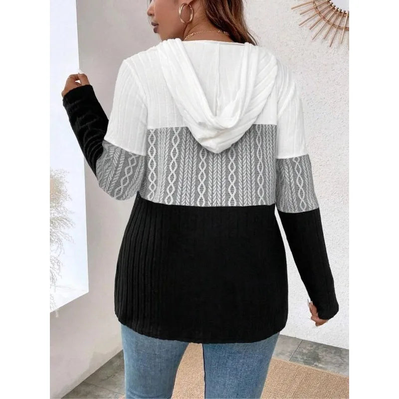Hooded zip-up top, back view, drawstring hood and long sleeves in white and black