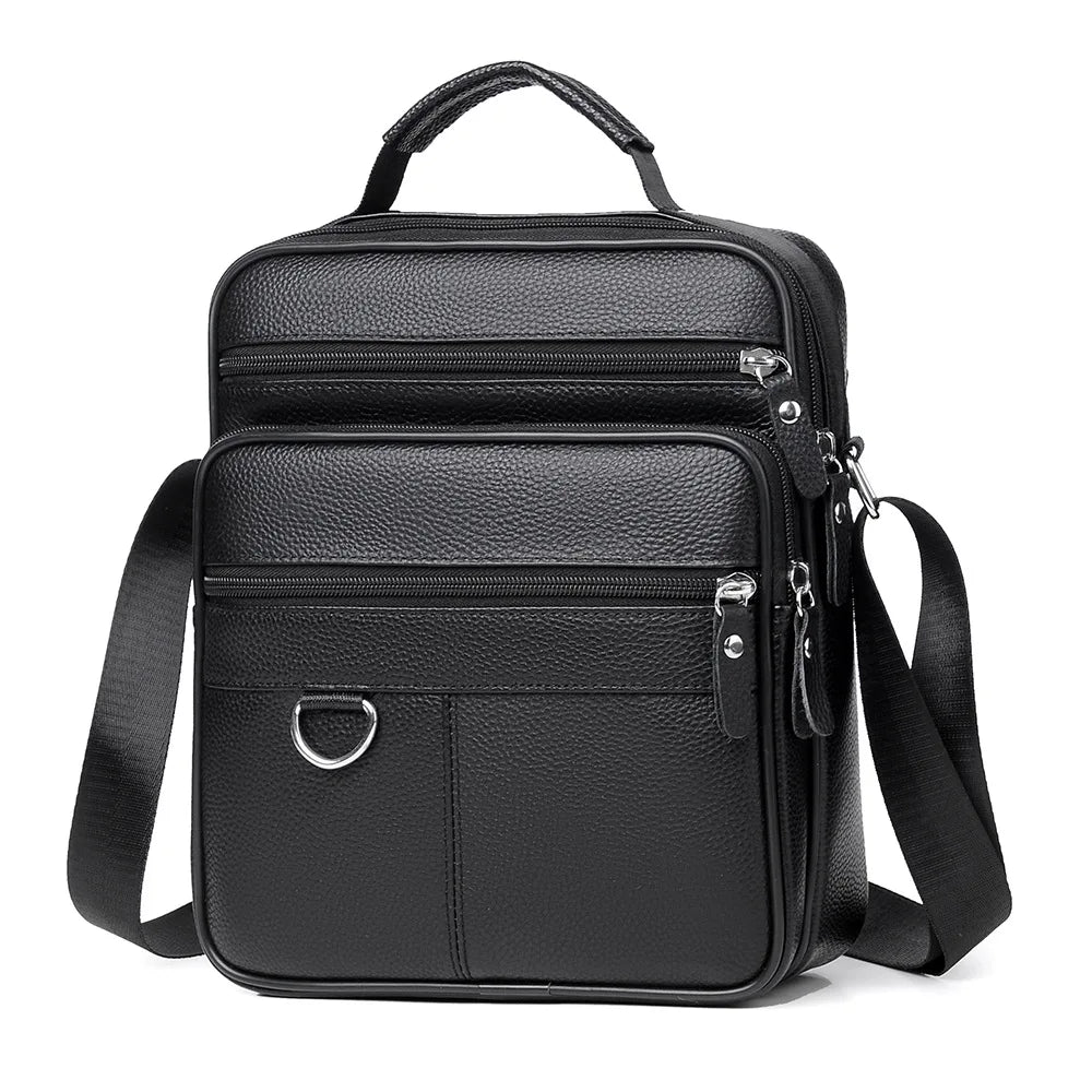 Black leather crossbody bag with top handle, front flap with metal ring, two zip rows